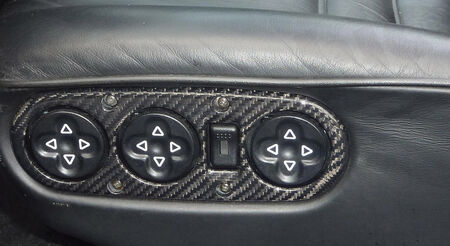 CARGRAPHIC Seat Adjustment Bezel - - Visual-Carbon<br>
- left and right<br>
<b>Part No.</b>G6455215007
